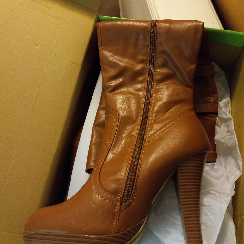 Tall tan knee heel boots